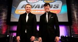 Chris Buescher and Erik Jones smile at the awards ceremony in 2015/